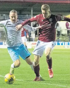  ?? ?? Above, Inverness’ Tom Walsh, left, battles with Arbroath’s Thomas O’Brien during January’s Championsh­ip match and, top, boss Billy Dodds.