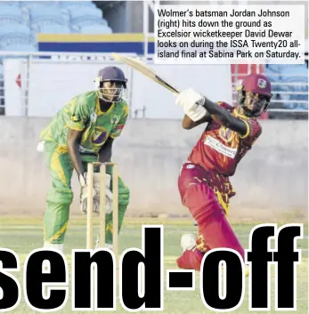  ?? ?? Wolmer’s batsman Jordan Johnson (right) hits down the ground as Excelsior wicketkeep­er David Dewar looks on during the ISSA Twenty20 allisland final at Sabina Park on Saturday.