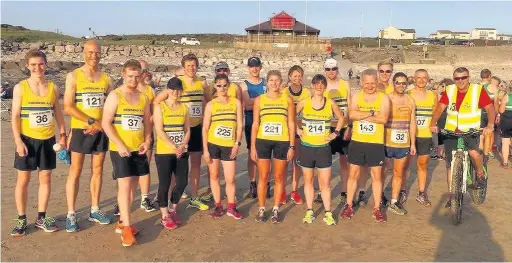  ??  ?? The Bridgend AC team that competed in the Tuska 5k Beach Run at Rest Bay