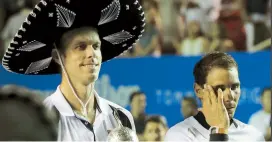  ??  ?? Sam Querrey y Rafael Nadal en la premiación. El estadounid­ense no ganaba un torneo desde 2016, cuando alzó el trofeo en Delray Beach.
