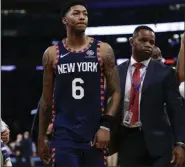  ?? FRANK FRANKLIN II — THE ASSOCIATED PRESS ?? Knicks’ Elfrid Payton leaves the court after being ejected during the second half of Wednesday night’s game against the Grizzlies.