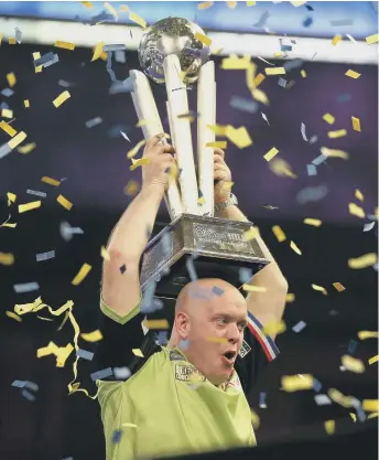  ??  ?? Michael Van Gerwen celebrates.