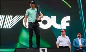  ?? Photograph: John Jones/USA Today Sports ?? Henrik Stenson, who has been removed as the European Ryder Cup captain, parades the LIV trophy after his victory in Bedminster.