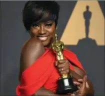  ?? JORDAN STRAUSS — INVISION VIA AP ?? Viola Davis poses in the press room at the Oscars on Sunday at the Dolby Theatre in Los Angeles.