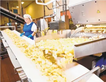  ?? COURTESY OF UTZ QUALITY FOODS ?? Utz Quality Foods, the potato chip maker in Hanover, York County, opened an in-house primary-care clinic at its York County headquarte­rs for the 2,000 employees and dependents covered by the company’s health plan there.