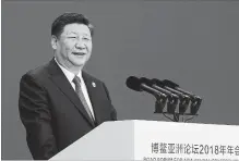  ?? LI XUEREN XINHUA NEWS AGENCY VIA THE ASSOCIATED PRESS ?? Chinese President Xi Jinping promises to cut auto import taxes, open China's markets further and improve conditions for foreign companies.