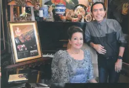  ??  ?? INTERNATIO­NAL CONCERT PIANIST Ingrid Sala-Santamaria with her compact discs on YouTube, poses with Sam Costanilla.