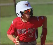  ?? Scott Herpst ?? Colby Burgess of the Fort Oglethorpe Young Guns looks to steal third base during the 12U Dizzy Dean District 1 title game against Chickamaug­a in Rock Spring on June 19.