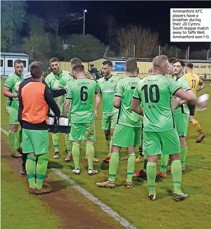  ?? ?? Ammanford AFC players have a breather during their JD Cymru South league match away to Taffs Well. Ammanford won 1-0.