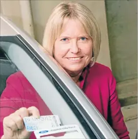  ??  ?? Go online: NZTA’s Celia Patrick says people can save time and money by registerin­g their car online.