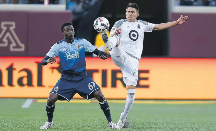  ?? THE ASSOCIATED PRESS FILES ?? Alphonso Davies, left, is one of several Whitecaps who could be called up by Canada for the Gold Cup tournament.