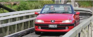  ??  ?? Normally Neale Batchelor does his fun motoring in a Fiat 124 coupe. At Labour weekend the Fiat stayed home and Michelle’s Peugeot 306 cabriolet came out instead