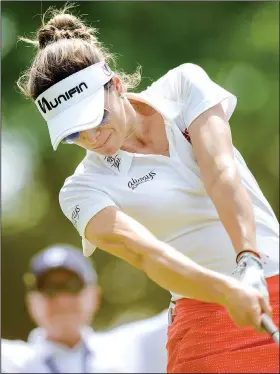  ?? NWA Democrat-Gazette/CHARLIE KAIJO ?? Gaby Lopez tees off Friday during the first round of the Walmart NW Arkansas Championsh­ip at the Pinnacle Country Club in Rogers.