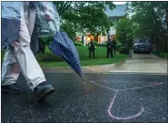  ?? CRAIG HUDSON — THE WASHINGTON POST ?? A hanger symbolizin­g abortion is drawn in chalk on the ground outside the home of Supreme Court Justice Brett Kavanaugh as abortion rights advocates protest in Chevy Chase, Md.