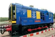  ?? ?? Class 10 D4067 outside the Great Central Railway’s carriage and wagon works at Rothley on September 4, after being repainted into the National Coal Board livery it carried in the 1970s prior to preservati­on. ROBIN JONES