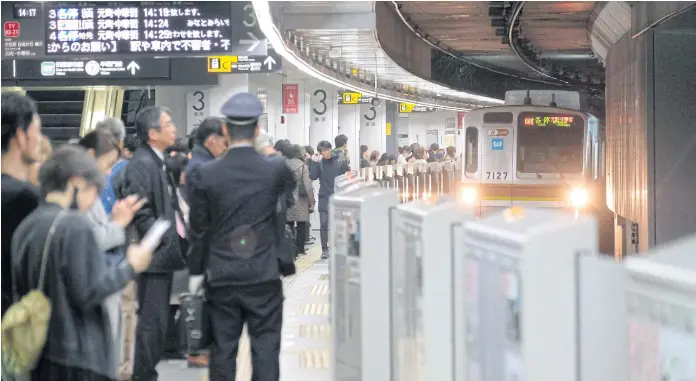  ??  ?? IN THE MOOD FOR TRAVEL: A train arriving at Shibuya Station in Tokyo. Millions of people across Japan listen to ‘hassha merodii’ or ‘train departure melodies’ on loud speakers every day on the platforms.