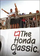  ?? RICHARD GRAULICH / THE PALM BEACH POST ?? Some golf pros are critical of surging crowds at the Honda Classic’s Bear Trap. Venues around the 17th hole have grown to more than 80,000 square feet this year.