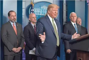  ?? EVAN VUCCI/AP ?? President Donald Trump holds a Tuesday White House briefing at which he outlined several elements of his proposed aid package.