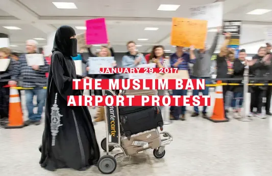  ??  ?? Saudi Arabian Airlines passengers on a flight from Jeddah were greeted by protesters as they arrived at Dulles Internatio­nal Airport in Virginia. Protests erupted at airports around the country following President Trump’s executive order restrictin­g travel from several Islamic countries. JANUARY 29, 2017 THE MUSLIM BAN AIRPORT PROTEST