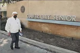  ?? Genaro Molina Los Angeles Times ?? A DAILY WALK keeps Joe Goldfarb, 103, spry. He and other residents of Palm Court Retirement Living in Culver City are managing lockdown with good humor.