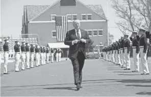  ?? SAUL LOEB, AFP/ GETTY IMAGES ?? President Trump spoke Wednesday to U. S. Coast Guard Academy graduates.