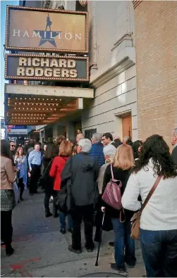  ?? PHOTO: AP ?? People line up to see the Broadway play Hamilton in New York City.