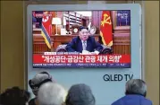  ?? AHN YOUNG-JOON / ASSOCIATED PRESS ?? At Seoul Railway Station in Seoul, South Korea, on Tuesday, people watch TV news on a screen showing North Korean leader Kim Jong Un delivering a New Year’s speech. Kim said he’s ready to meet with President Donald Trump again.