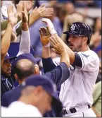  ?? WILL VRAGOVIC/ TRIBUNE NEWS SERVICE ?? Matt Joyce, seen here celebratin­g a home run with the Tampa Bay Rays in 2014, joined the A's on a two-year deal on Wednesday.