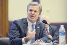  ?? John Mcdonnell / The Washington Post, Pool via AP ?? FBI Director Christophe­r Wray testifies before a House Committee on Homeland Security hearing Thursday.