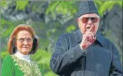  ?? PTI ?? National Conference patron Farooq Abdullah with his wife Molly at his Gupkar residence in Srinagar on Friday.