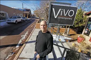  ??  ?? Warren Keating, who runs Vivo Contempora­ry and is director of the Canyon Road Gallery Associatio­n, in front of the gallery on Dec. 16. He says the pandemic has taken something vital from one of the city’s most vibrant thoroughfa­res.