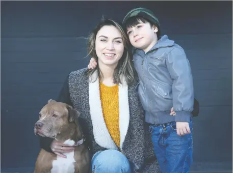  ?? JULIE OLIVER ?? With Kyla Anka’s dog-grooming business shut down during the pandemic, she worries about the basics of paying rent and putting food on the table. Above; Anka with her five-year-old son, Jordan Martinez, and their beloved dog Karma.