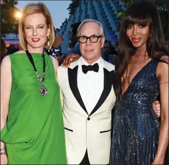  ??  ?? Star backing: With designer Tommy Hilfiger and Naomi Campbell at a gallery party