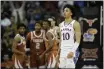  ?? CHARLIE RIEDEL — THE ASSOCIATED PRESS ?? Kansas forward Jalen Wilson (10) walks to the bench for a timeout during the first half of the championsh­ip game against Texas in the Big 12 Conference tournament Saturday in Kansas City, Mo.