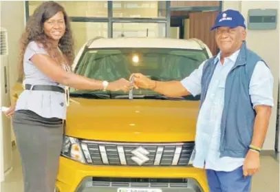  ??  ?? L-R: Aissatou Diouf, General Manager of CFAO Motors (Suzuki), handing over the key of Suzuki Hrand Vitara to Dr Newton Jibunoh, Founder, Fight Against Desert Encroachme­nt (FADE), as Suzuki Brand Ambassador in Nigeria in Lagos Lagos recently