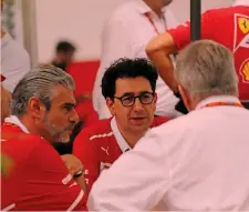  ?? LAPRESSE ?? Mattia Binotto, 48 anni, di fronte, con il team principal Ferrari Maurizio Arrivabene, a sinistra, e con Ross Brawn, di spalle
