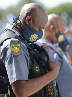  ?? | HENK KRUGER African News Agency (ANA) ?? MINISTER of Police Bheki Cele welcomed police officers during a parade at 35 Squadron in Delft. The officers will assist police to combat crime in various parts of the province.