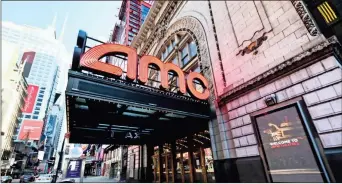  ?? AP-Evan Agostini, File ?? AMC Empire 25 theatre appears on 42nd Street in New York. Last weekend, theaters were cleared to open begin opening in some New York State counties at under 50% capacity and this weekend San Francisco will join in too. New York City and Los Angeles remain closed, however. AMC Theaters and Cinemark are largely up and running. Approximat­ely 54% of screens are open in the U.S., according to the National Associatio­n of Theater Owners.