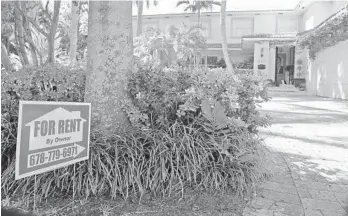  ?? AMY BETH BENNETT/SOUTH FLORIDA SUN SENTINEL ?? A “For Rent By Owner” sign has gone up outside the home of Roger Stone on Coral Way in Fort Lauderdale.