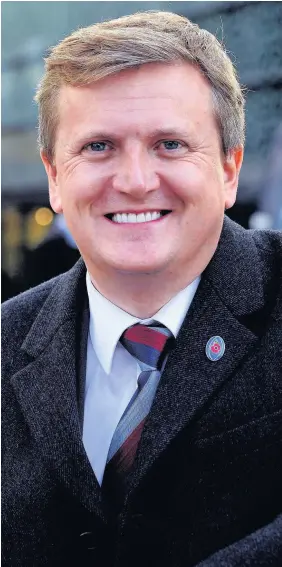  ?? Richard Williams ?? > Singer and television presenter Aled Jones in Cardiff city centre to launch the Royal British Legion Poppy appeal 2017