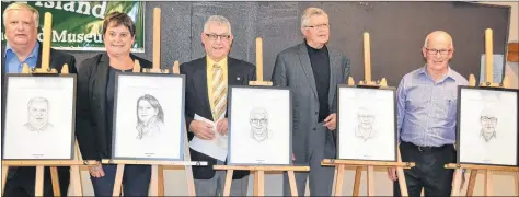  ?? ERIC MCCARTHY/JOURNAL PIONEER ?? The 2018 P.E.I. Curling Hall of Fame inductees, from left, Derek MacEwen, Susan McInnis, Cliff Poirier, Ernie Stavert and Clair Sweet pose beside their portraits.