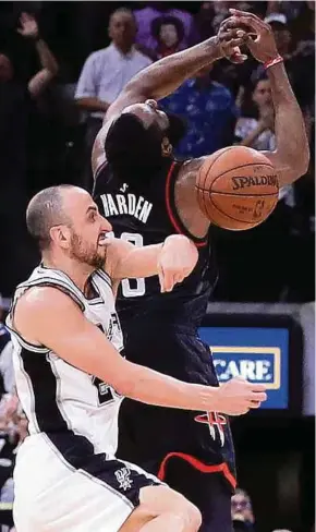  ?? AFP PIC ?? Spurs’ Manu Ginobili (left) makes the block against the three-point attempt by Rockets’ James Harden on Tuesday.