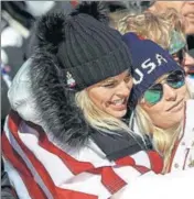  ??  ?? ■ Lindsey Vonn (R) of the US is consoled at the finish of the Alpine Skiing Ladies SuperG. GETTY IMAGES