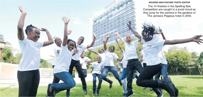  ?? RICARDO MAKYN/CHIEF PHOTO EDITOR ?? The 14 finalists in the Spelling Bee Competitio­n are caught in a jovial mood as they jump for the camera in the gardens of The Jamaica Pegasus hotel in 2016.