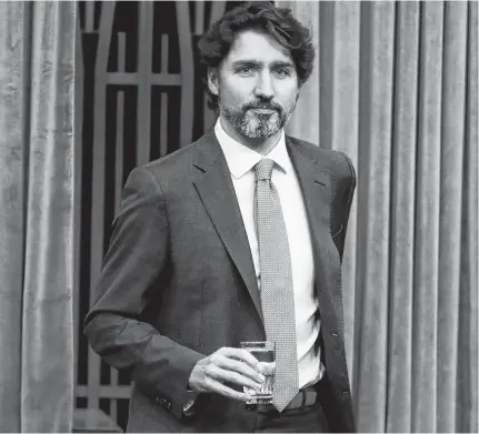  ?? BLAIR GABLE • REUTERS ?? Prime Minister Justin Trudeau arrives to a meeting of the special committee on the COVID-19 pandemic in the House of Commons on Parliament Hill in Ottawa on Wednesday.