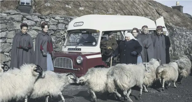  ??  ?? 0 Scenes from the Call the Midwife Christmas special, above and below, and one of the Queens Nurses, Catriona Prentice, weighs a baby on Uist, below right