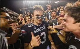  ?? CARMEN MANDATO / GETTY IMAGES ?? South Carolina freshman quarterbac­k Ryan Hilinski stepped in for an injured Jake Bentley and has played well. He passed for 324 yards and two touchdowns against then-No. 2 Alabama on Sept. 14.