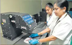  ?? PHOTOS: HTCS ?? Dr A Nirmala Grace (right), with her PhD student G Subashini, testing the assembled solar cell with 1Sun class AAA solar simulator