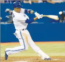  ?? THE CANADIAN PRESS ?? Toronto Blue Jays’ Yunel Escobar breaks his bat as he hits a double off a ball from Baltimore Orioles pitcher Miguel Gonzalez during the seventh inning of MLB American league baseball action in Toronto on Wednesday.