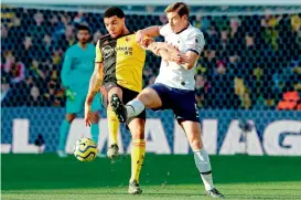  ?? AFP ?? Watford striker Troy Deeney (left) vies for the ball with Tottenham Hotspurs defender Jan Vertonghen during their English Premier League match at Vicarage Road Stadium in Watford, north of London on Saturday. The match ended in a 0-0 draw. —